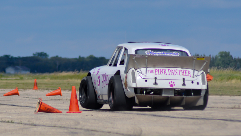 Lifting a wheel in the MGB GT.